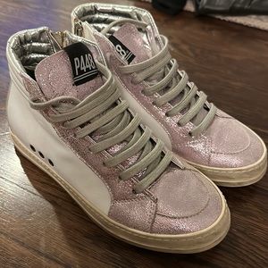 P448 new pair of high tops worn maybe twice. Too small.  White with pink.